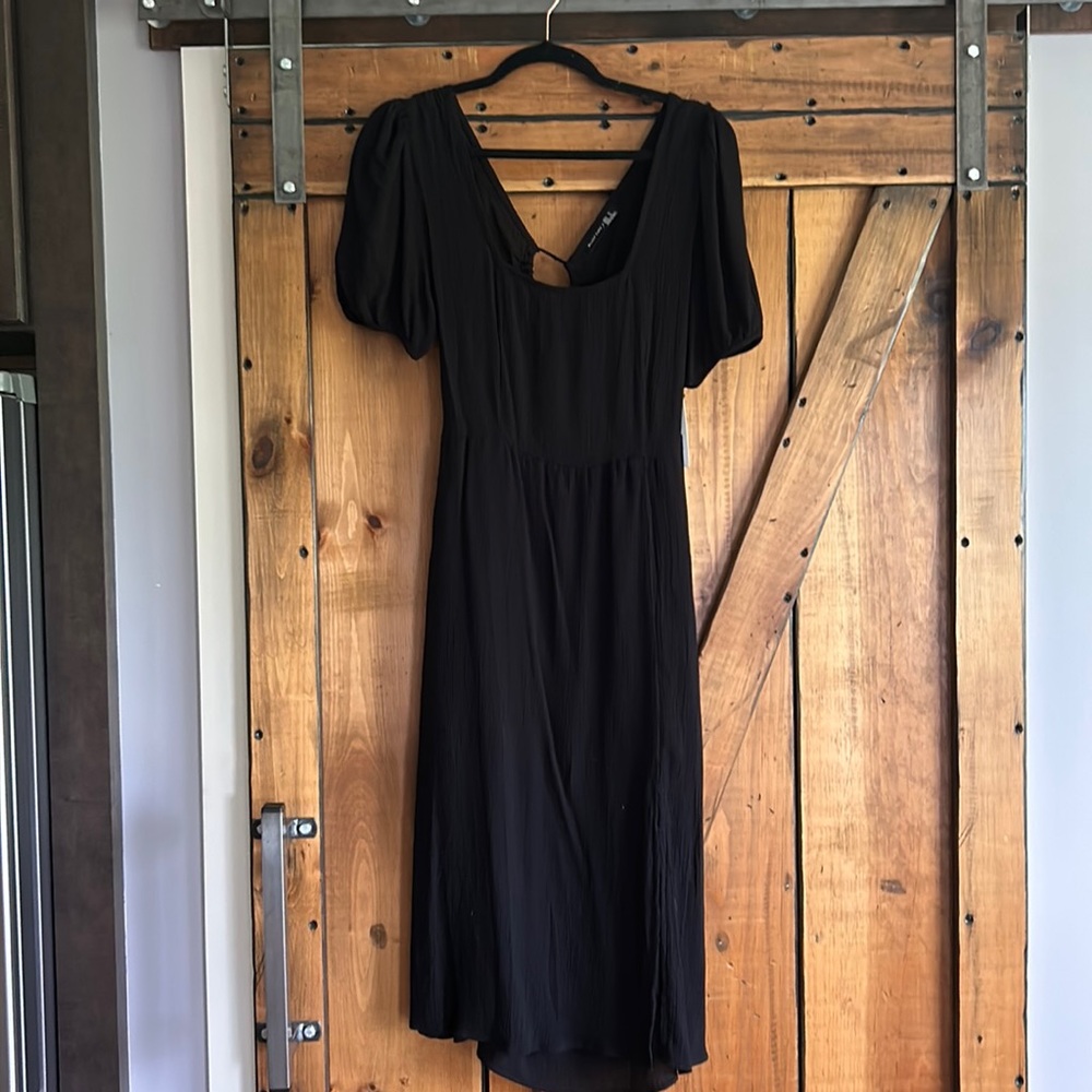 Black dress NWT ladies size Medium by Black Tape. Light, flowing fabric